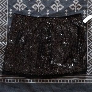 Jennifer Lopez sequin mini-skirt, size 14, black+